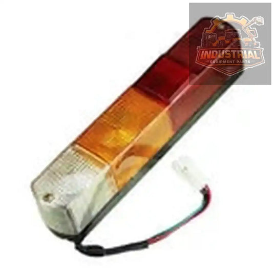 Mitsubishi/Caterpillar forklift rear combination lamp showing red and clear lenses with mounting brackets.